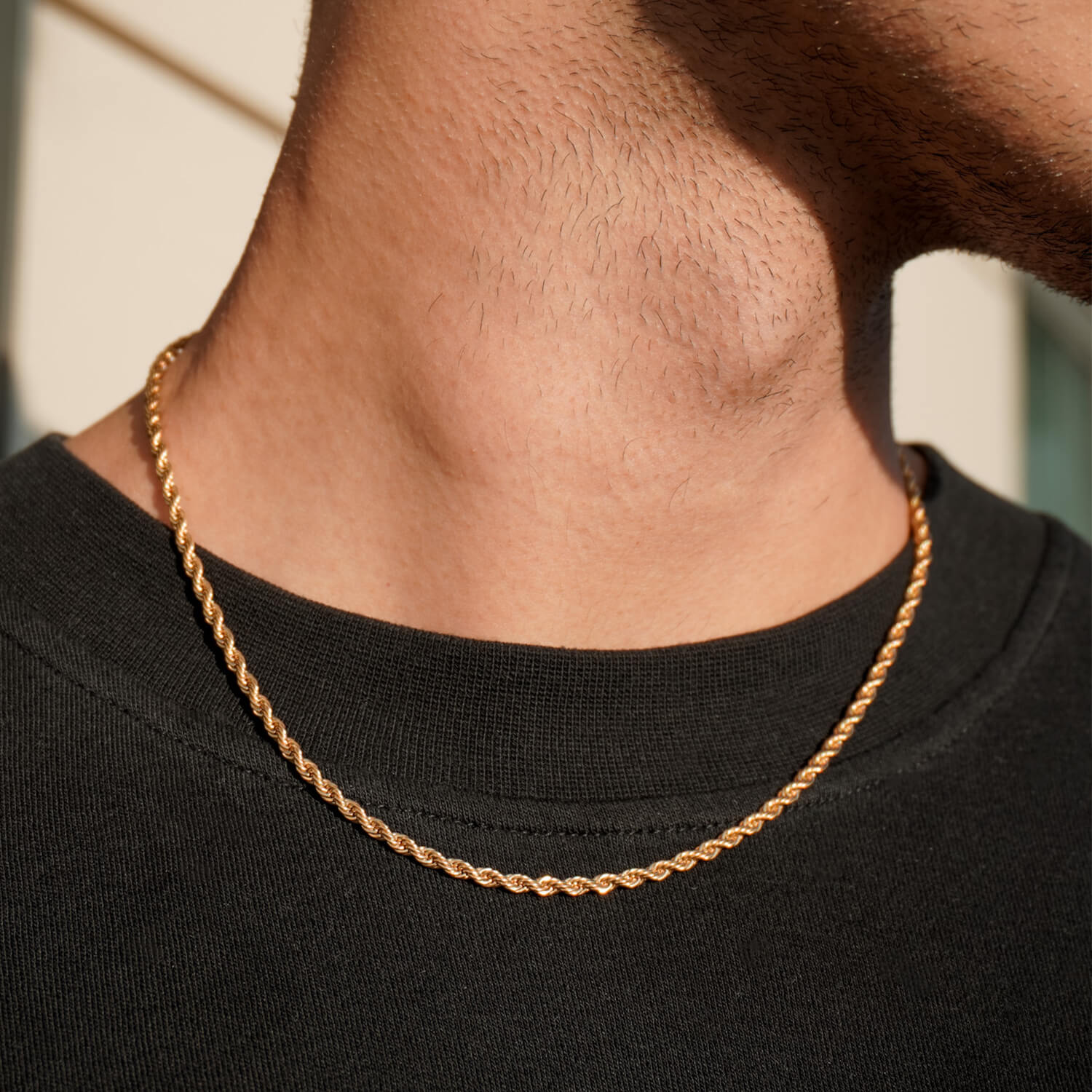 3mm gold rope chain on male neck