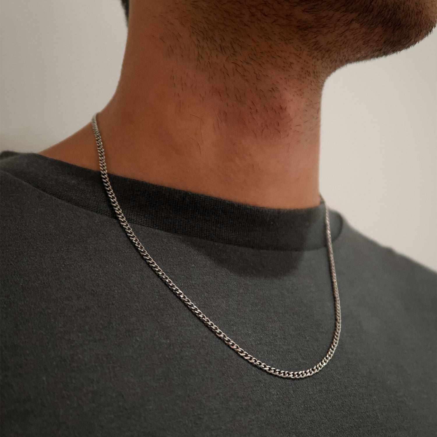 3mm silver cuban link chain on male neck