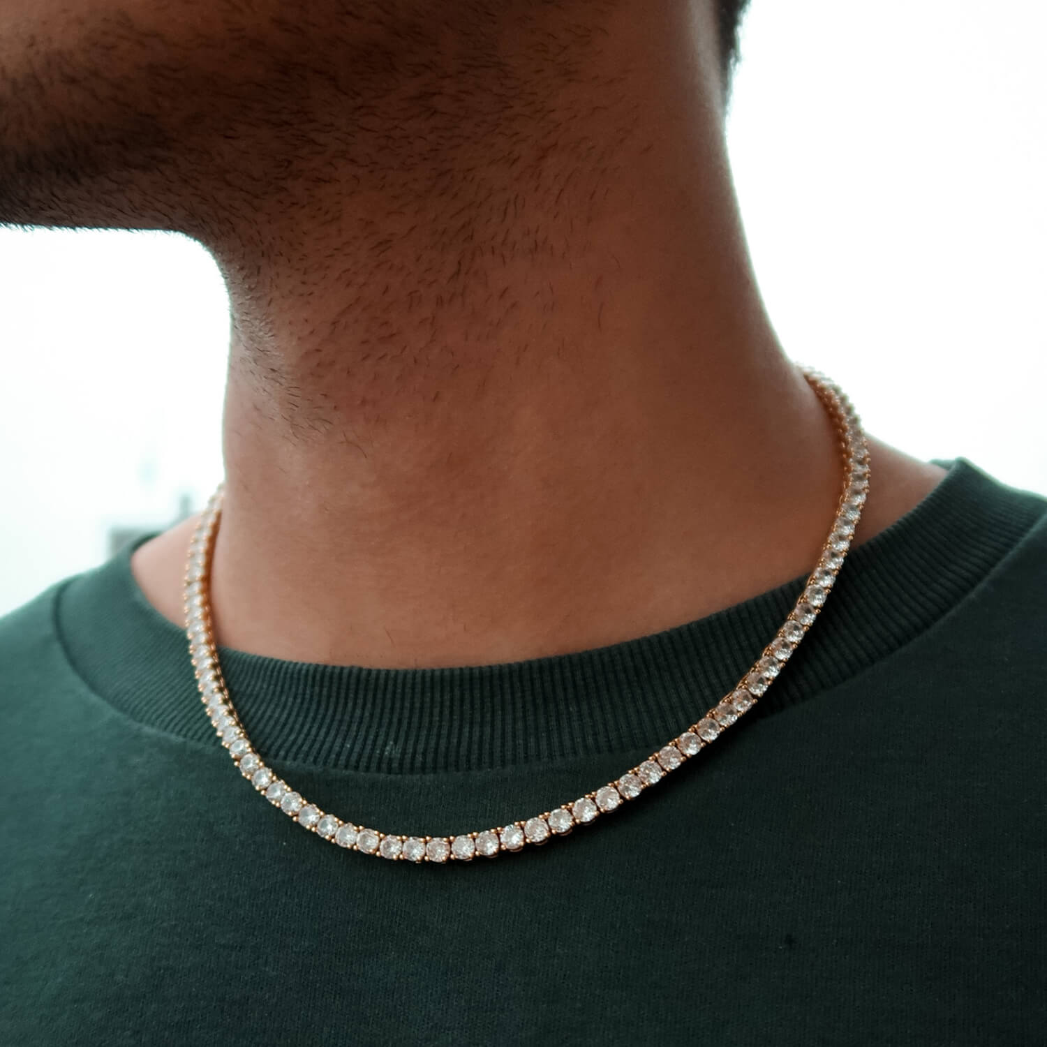 4mm gold tennis chain on male neck